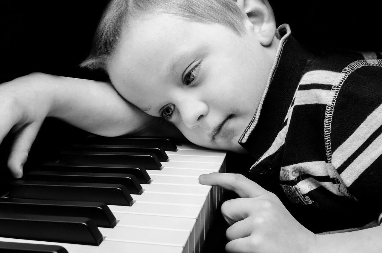 boy learn piano