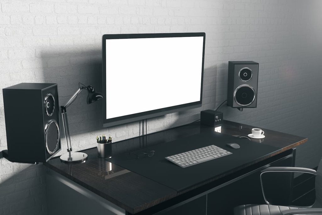 desktop with home speakers